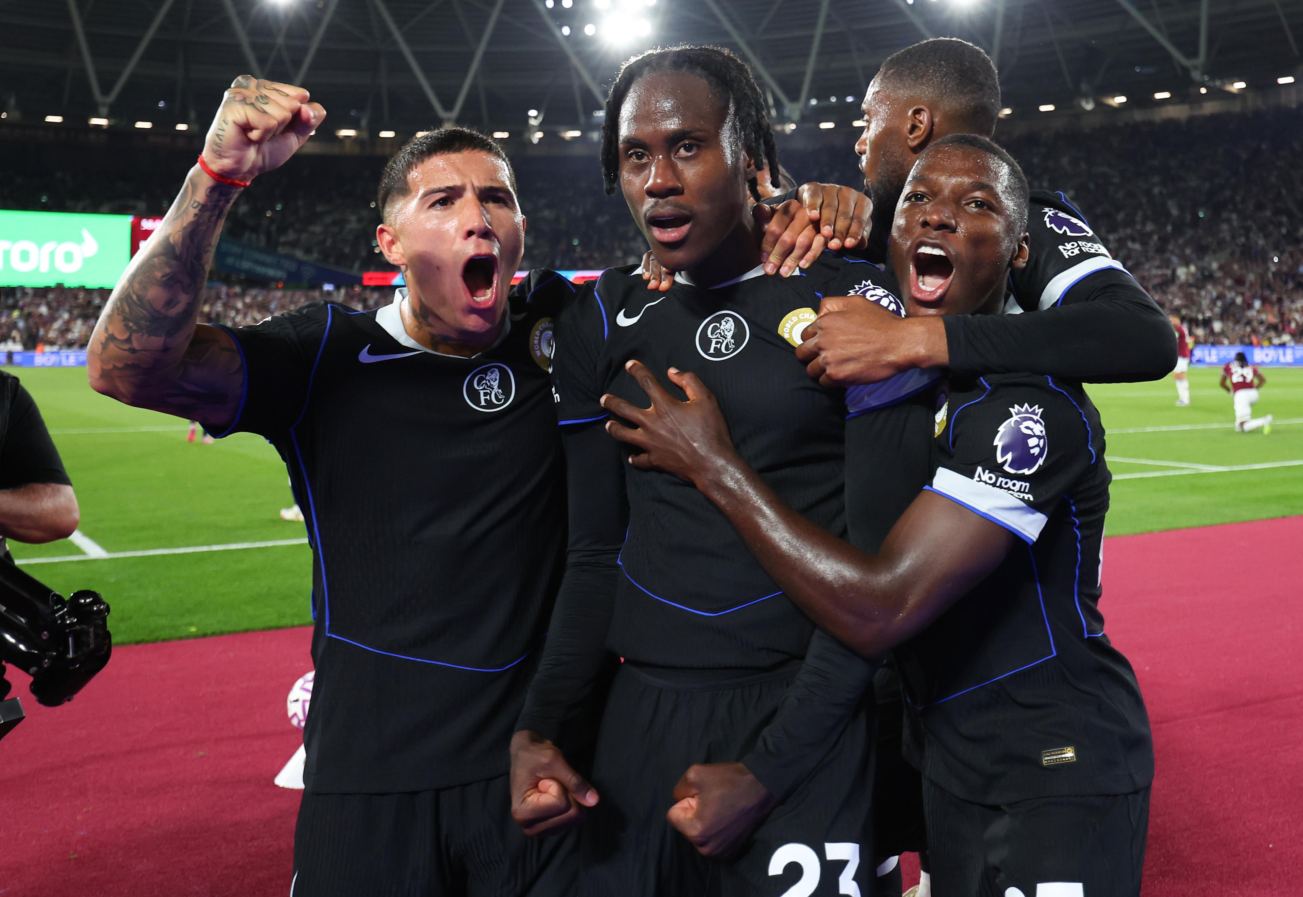 Trevoh Chalobah celebrates scoring Chelsea's fifth goal with Enzo Fernandez and Moises Caicedo