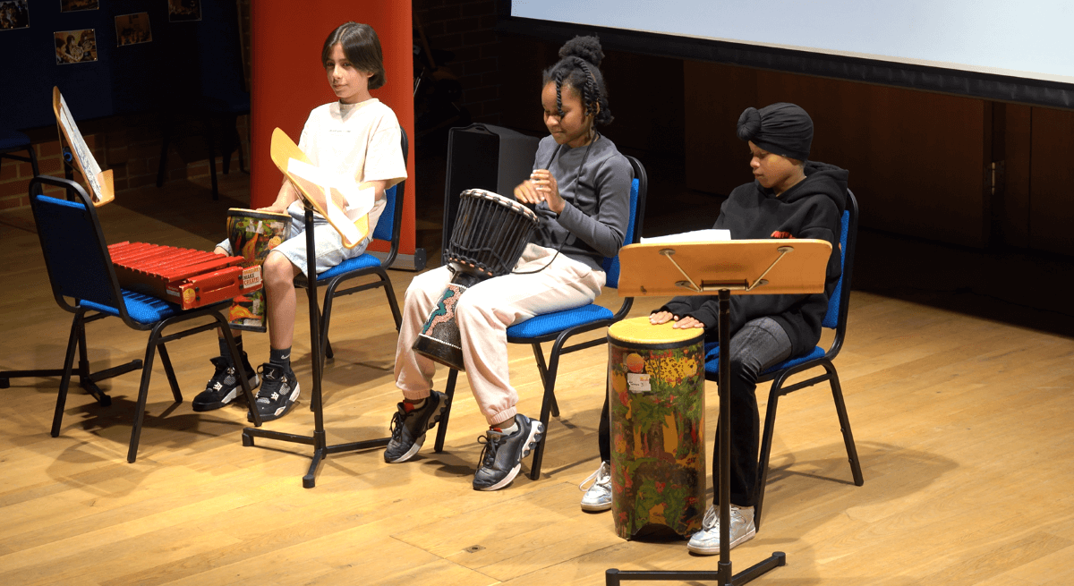 Three young carers perform at their summer showcase