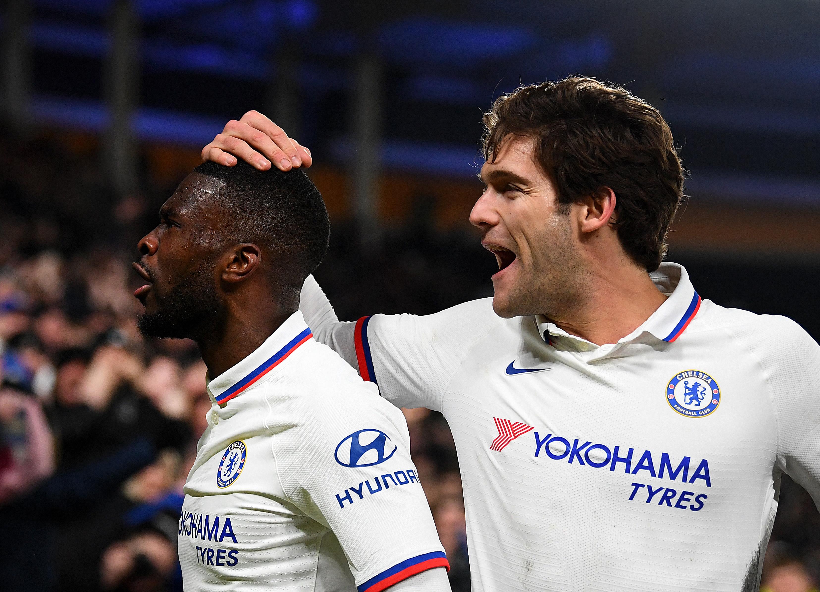 Fikayo Tomori celebrates scoring a goal with a team mate