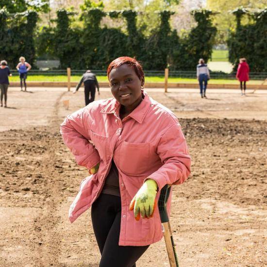 Volunteers sowing wildflowers on the former paddling pool site in Eelbrook Common, Fulham