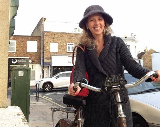 Connie Carrasco with her bike that she purchased from one of her Nextdoor neighbours