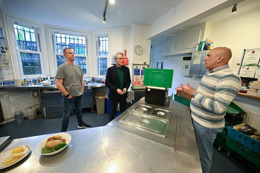 Cllr Coleman talks to Barons Court Project director Michael Angus (right) and chef Simon Taylor (left)