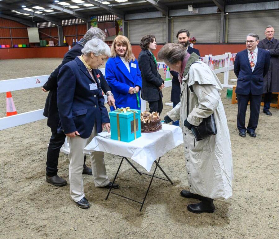 Sister Mary Joy, Founder of Wormwood Scrubs Pony Centre, and HRH The Princess Royal cutting the cake