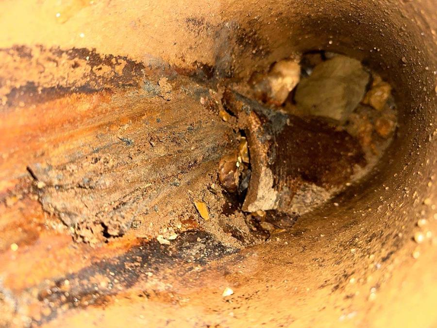 Concrete damage in a North End Road sewer pipe