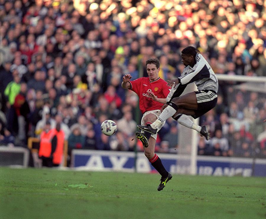 Louis Saha getting the better of Gary Neville during an FA Cup tie in 2001
