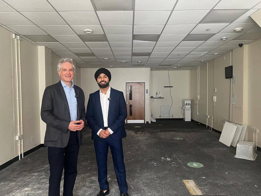 H&F Deputy Leader Cllr Ben Coleman with new Fulham postmaster Ajinder Kapoor inside the council's former Housing Office