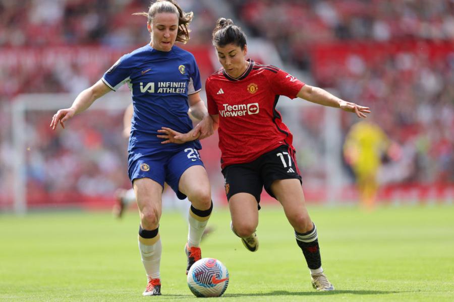 Lucia Garcia of Manchester United under pressure from Chelsea's Niamh Charles