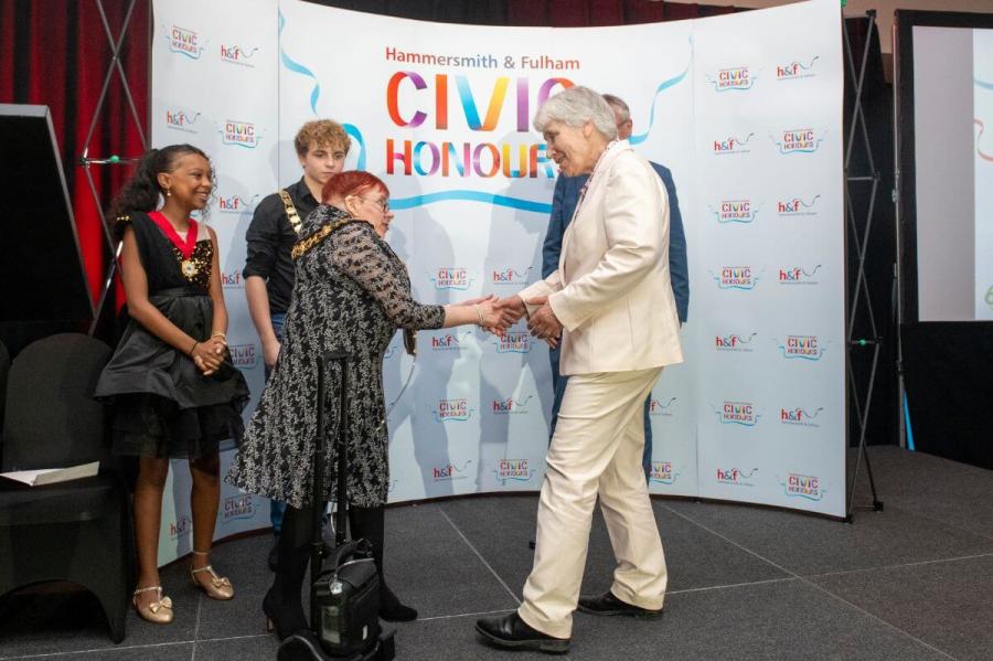 Sister Mary-Joy Langdon (right) accepts her Civic Honour from Cllr Patricia Quigley, Mayor of H&F (left)