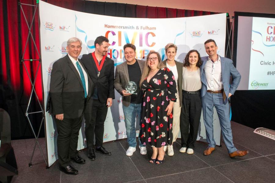 West London Queer Project accept their Civic Honour from Cllr Chevoppe-Verdier (second from left)