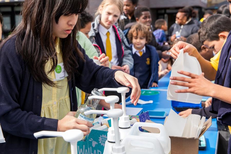 St John XXIII Catholic Primary School pupil at the school's new Refill Stop shop