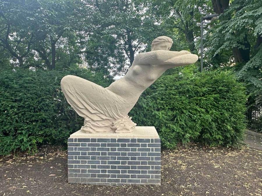 Restored Leaning Woman sculpture
