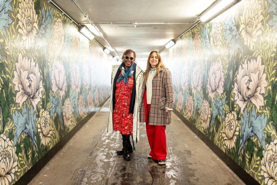 Cllr Sharon Holder (left) with artist Lisa Pfeiffer (right) in the Nigel Playfair underpass, also known as Unity Way