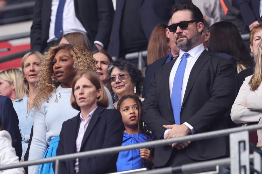 Serena Williams and Alexis Ohanian watch on in the stands
