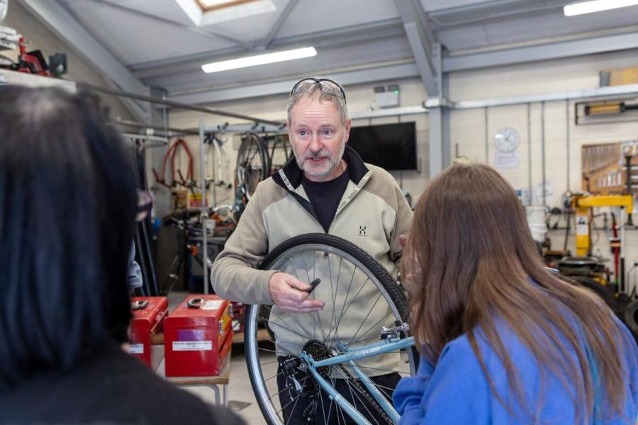 Bike maintenance class in the Macbeth Centre's garage
