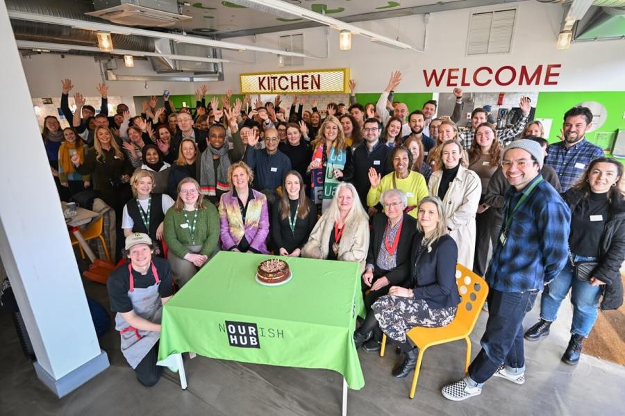 H&F Deputy Mayor Cllr Daryl Brown (front row, third from right) at the third anniversary celebrations at the Nourish Hub