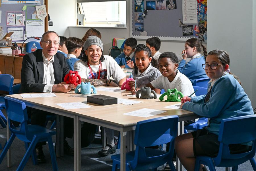 MP Andy Slaughter (far left) gets creative with Ark White City students