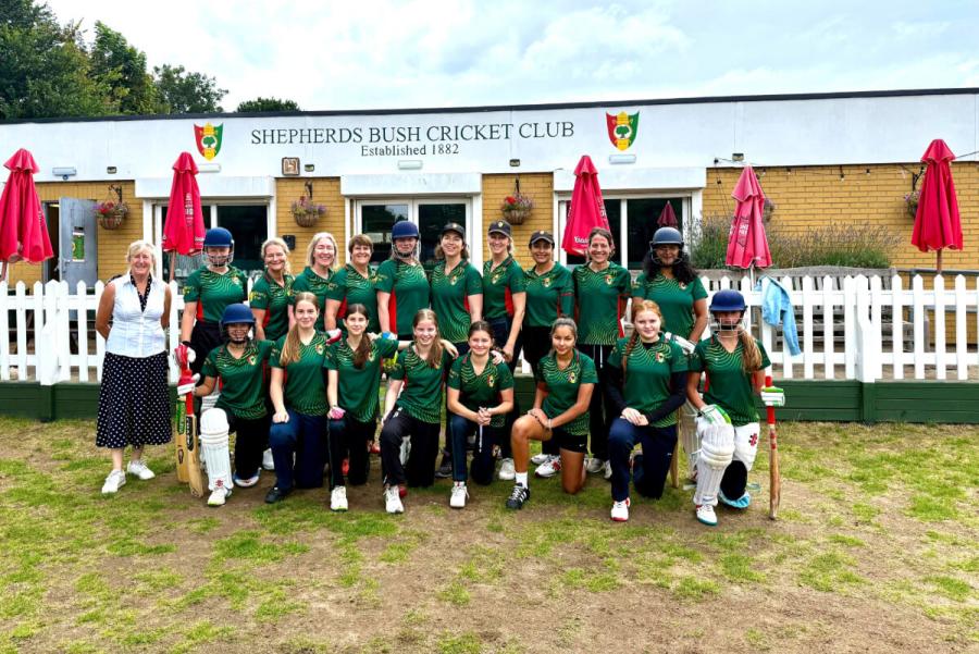 The Shepherds Bush Cricket Club women in front of the pavilion at Bromyard Avenue