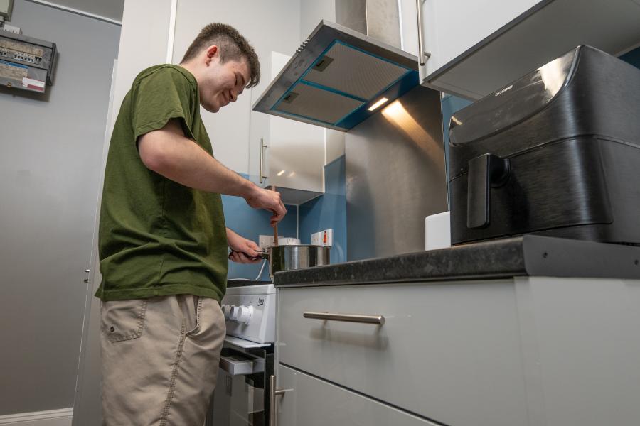 Ben cooking in the newly refurbished kitchen