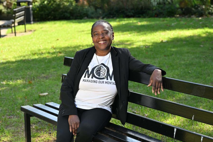 Alison Roberts wearing Managing Our Mental t-shirt