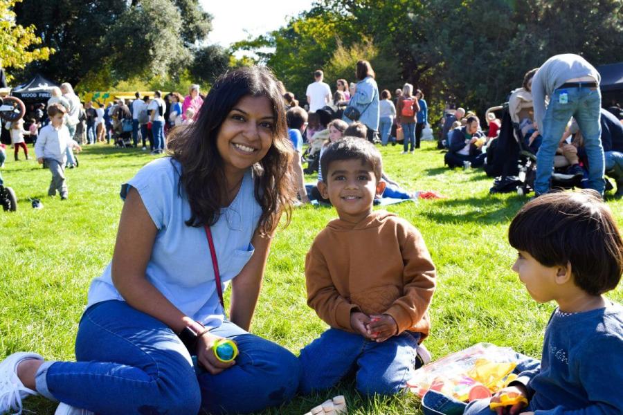 Family enjoying a picnic on the lawn