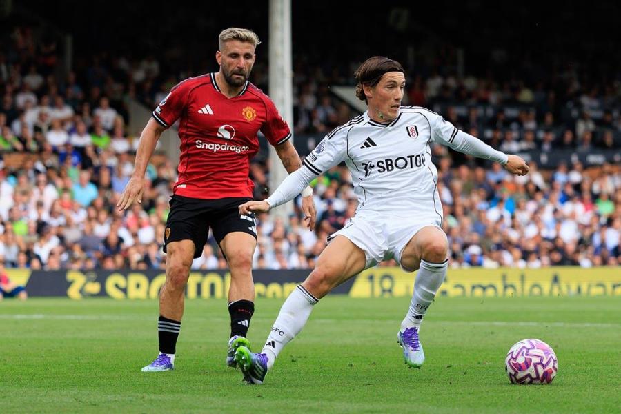 Harry Wilson gets away from Luke Shaw