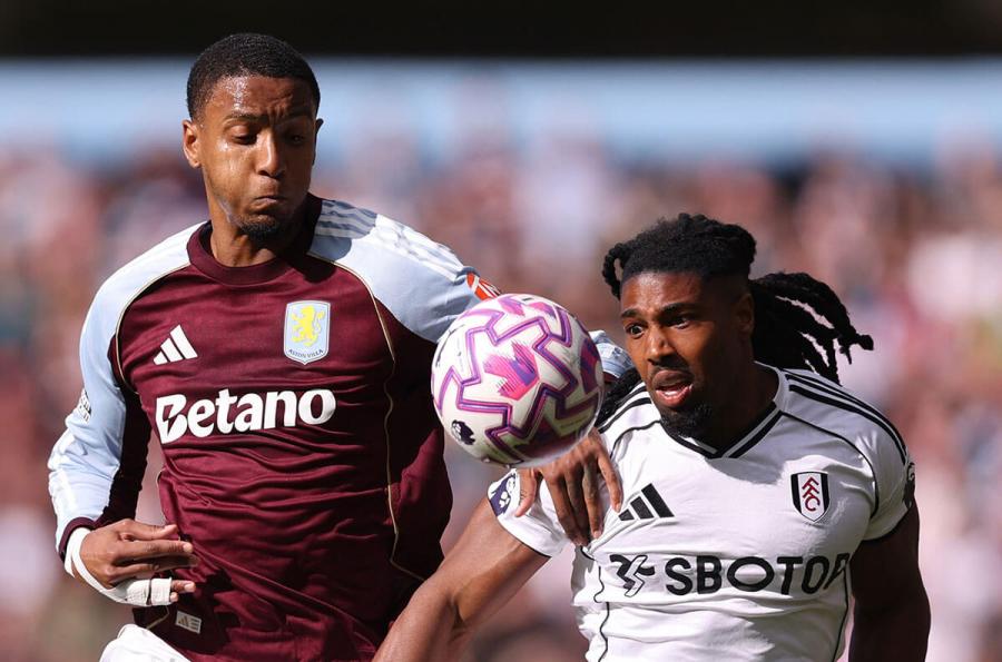 Ezri Konsa tussles with Adama Traore