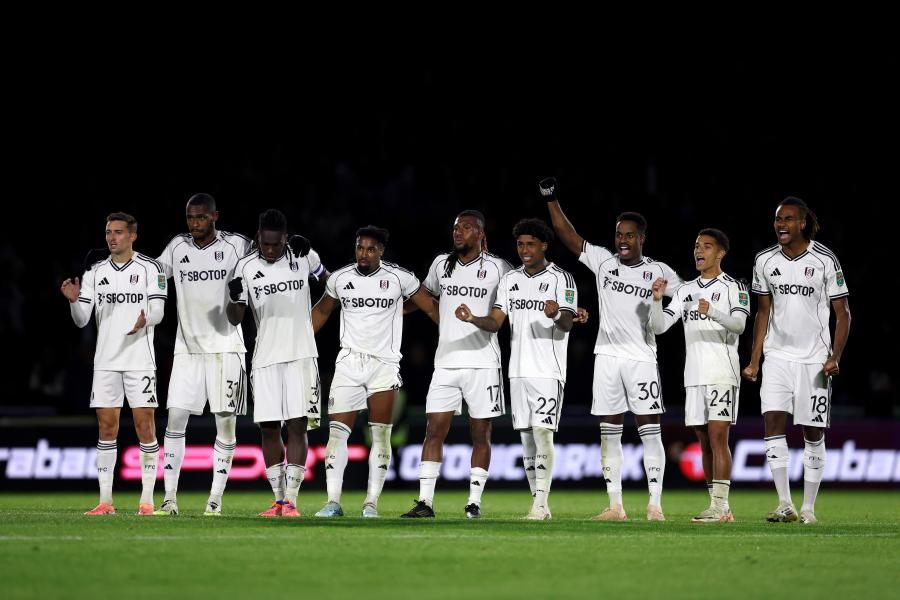 Fulham players celebrate in the penalty shoot out