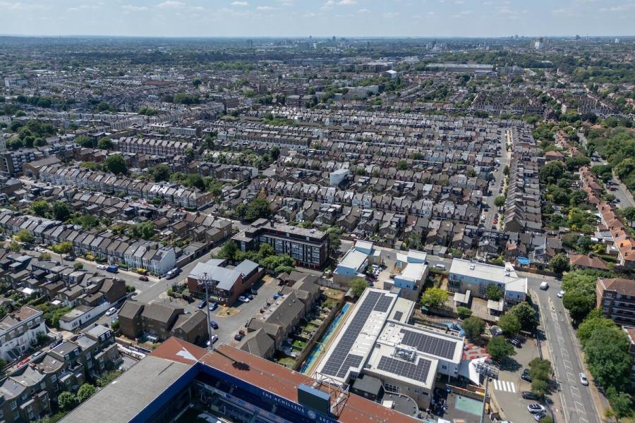 Aerial view of the solar panel covered roof of Jack Tizard school in White City
