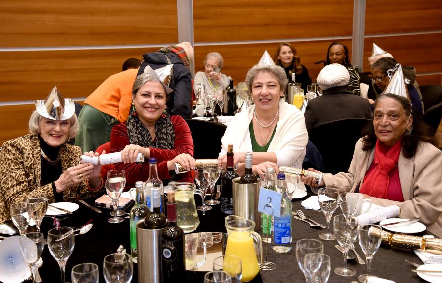 Guests pull crackers at last year's Big Christmas Lunch