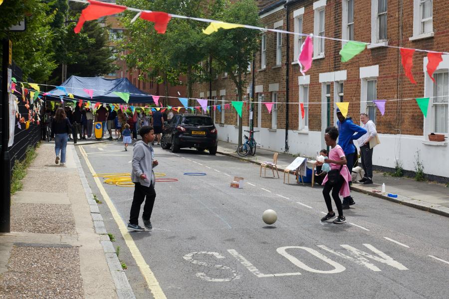 Pupils playing football on Banim Road